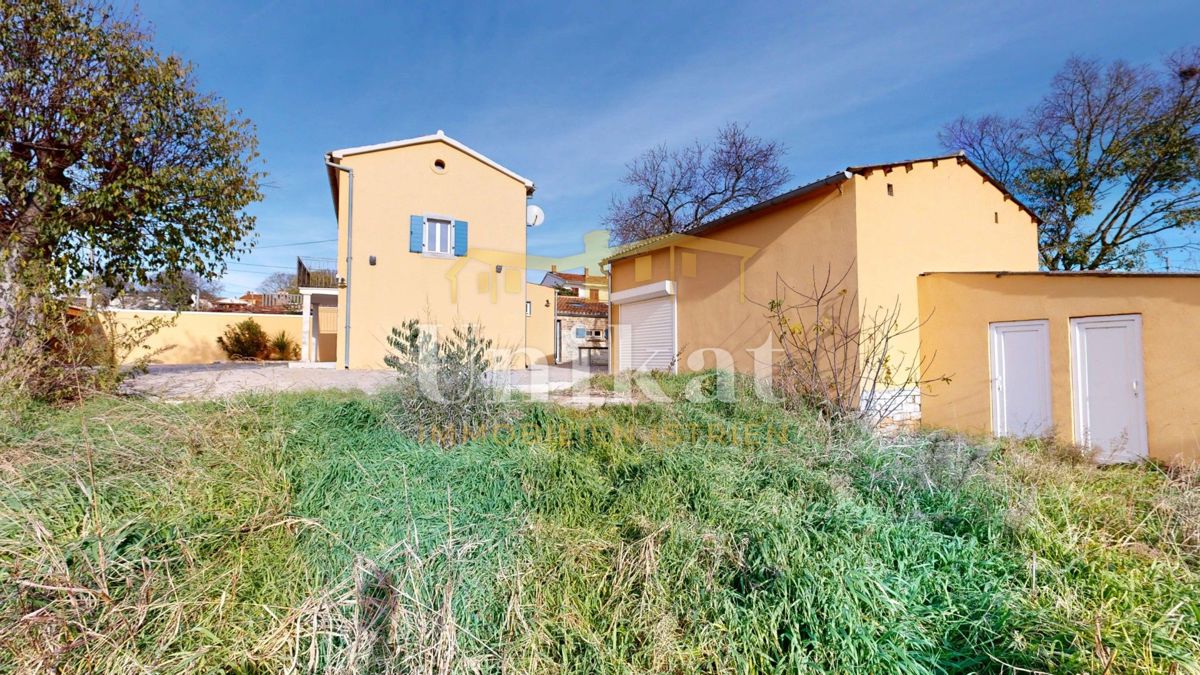 Dvojna kuća con garage e ampio giardino